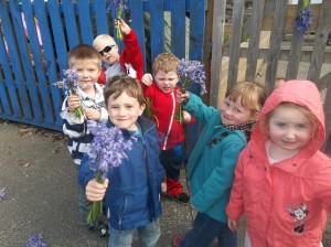 Pre School Decorating The Fence For Flora Day